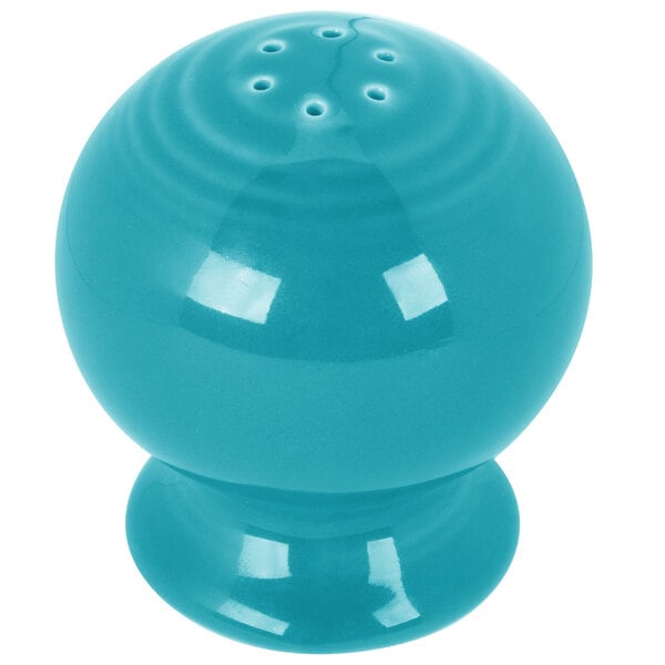 A turquoise Fiesta pepper shaker with holes.
