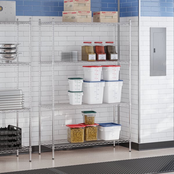 A chrome 4-shelf wire shelving unit with various food storage containers and boxes placed on the shelves.