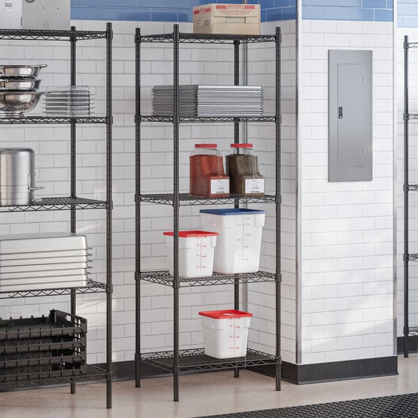A black epoxy 5-shelf storage rack with 72-inch posts, used for organizing kitchen supplies.