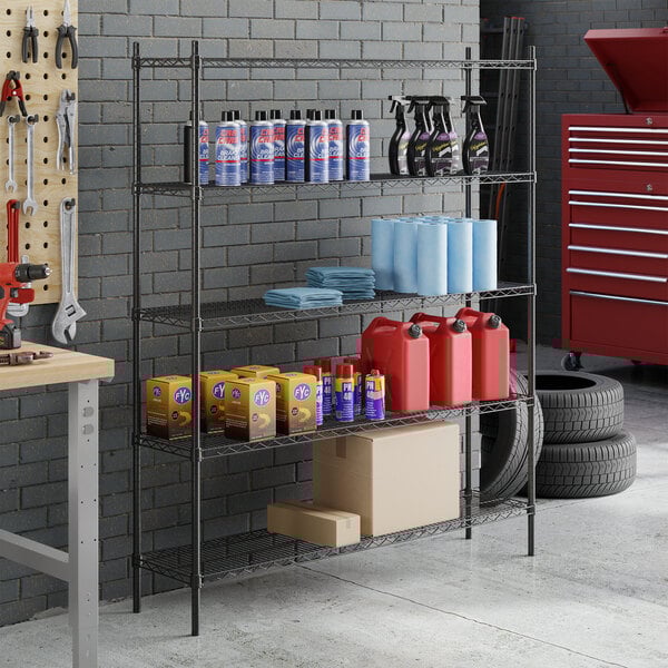 A black epoxy 5-shelf storage rack with various automotive and cleaning supplies organized on it.