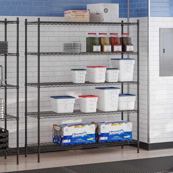 A black epoxy 5-shelf storage rack with various containers and boxes placed on the shelves.