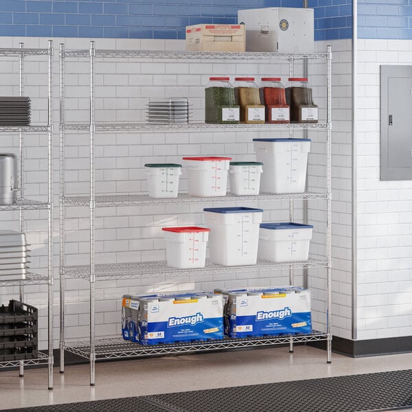 A chrome 5-shelf storage rack with various containers and boxes placed on its shelves.