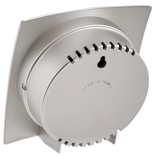 A Taylor white wall-mounted indoor thermometer and hygrometer with a silver circular frame.