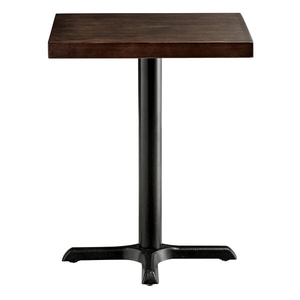 A square wooden table top with an espresso finish and a black cast iron base plate.