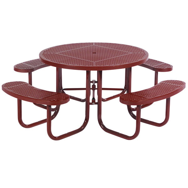 A red Wabash Valley round picnic table with attached seats and a perforated top.