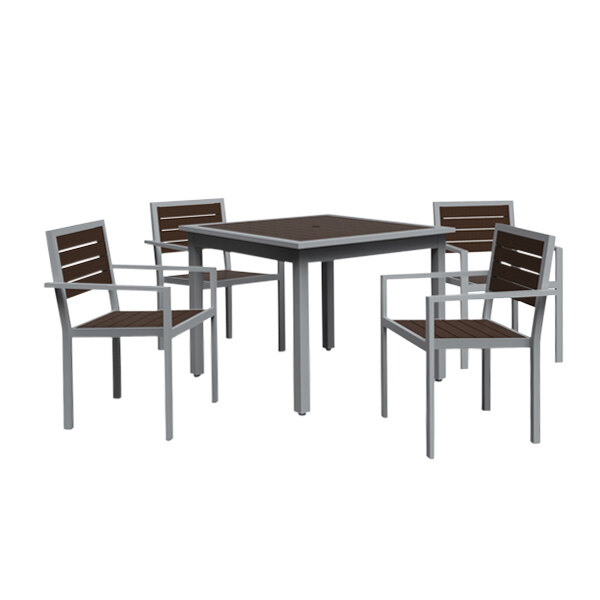 A Wabash Valley Green Valley square dining table with chairs around it.