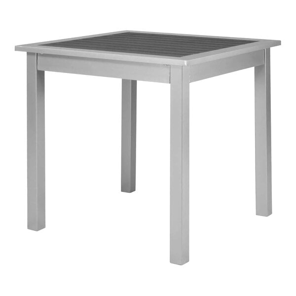 A rectangular Wabash Valley table with a black PolyTuf top and silver legs.