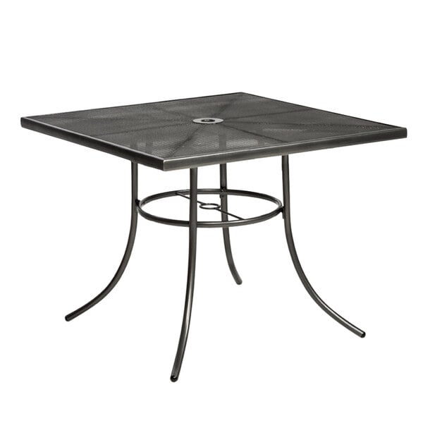 A Wabash Valley Sullivan square table with a powder coated wire mesh top.