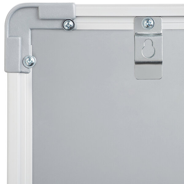 A Dynamic by 360 Office Furniture whiteboard with a silver aluminum frame.