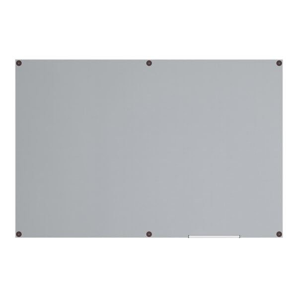 A large frameless wall-mount frosted glass dry erase board.