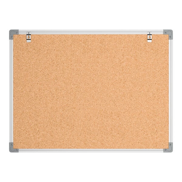 A rectangular wall-mount cork board with an aluminum frame.