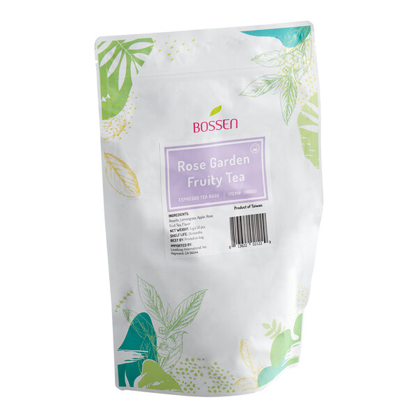 A white resealable bag with green and yellow leaf illustrations, labeled 'Bossen Rose Garden Fruity Tea' with a purple label and product information.