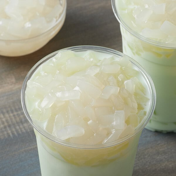 iced coconut milk tea topped with coconut jelly