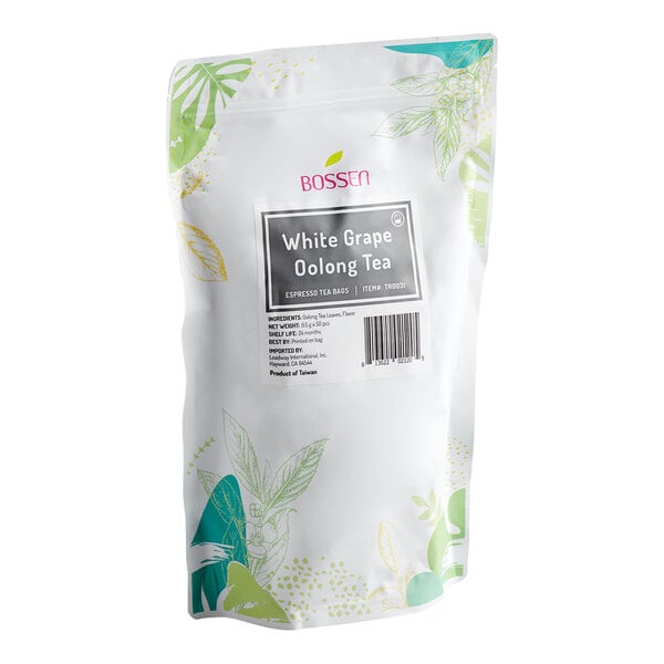 A white resealable pouch with green and yellow leaf designs, labeled 'Bossen White Grape Oolong Tea' with product information and a barcode on the front.