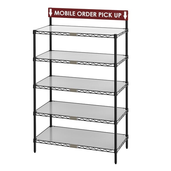 A black metal Metro shelving unit with a sign.