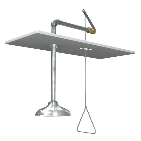 A Guardian Equipment stainless steel emergency shower with a metal pole and wire.