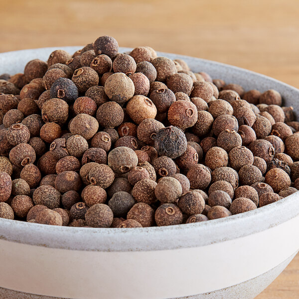 Whole allspice berries in a bowl