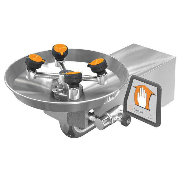 A Guardian Equipment wall mounted eye and face wash station with a stainless steel bowl and orange knobs.