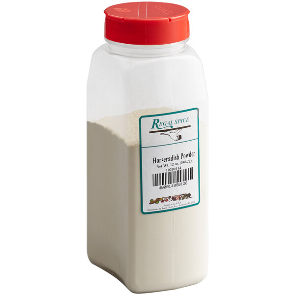 A plastic container with a red label filled with Regal Horseradish Powder.