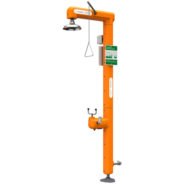 An orange Guardian Equipment heated safety station with a green sign above.