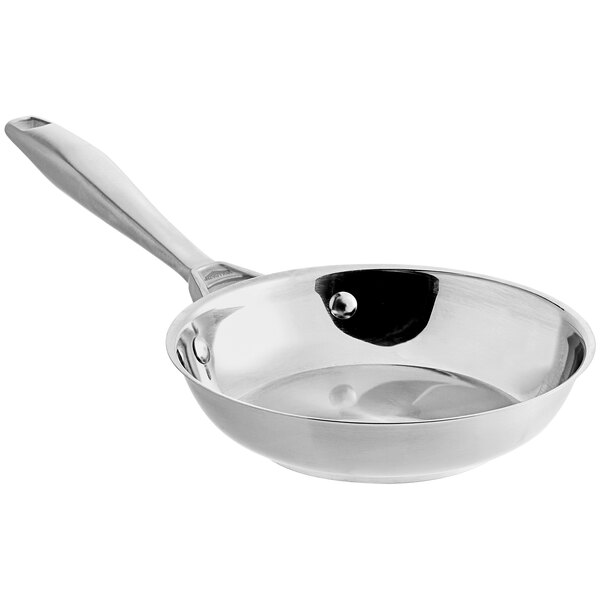 A Vollrath stainless steel fry pan with a handle.