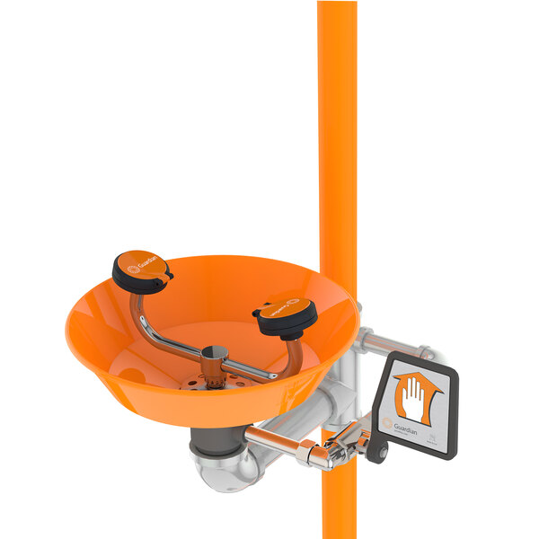 A Guardian Equipment eye and face wash station with a plastic bowl and orange and black accents.