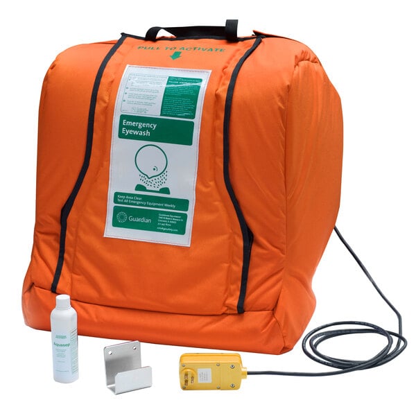 An orange Guardian AquaGuard eye wash station with white insulation.