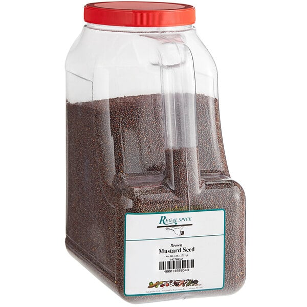 A plastic container of brown Regal mustard seed.