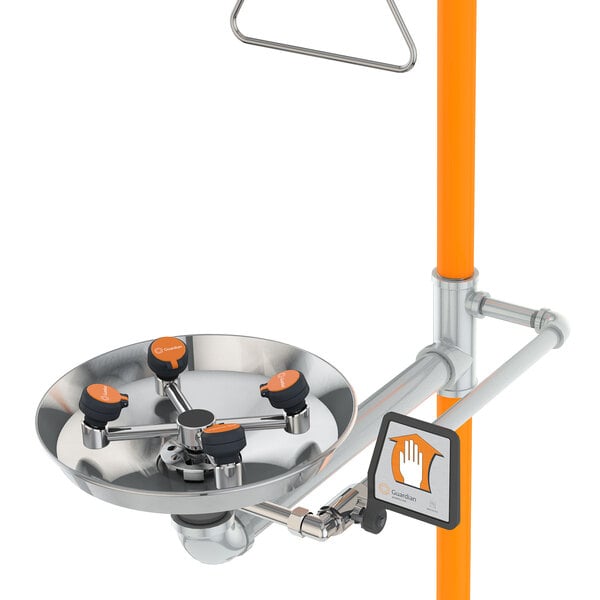 A Guardian Equipment safety station with orange handles and a round metal shower head.