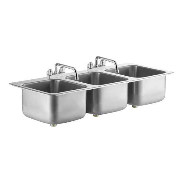 A Regency stainless steel drop-in sink with three bowls and two faucets.