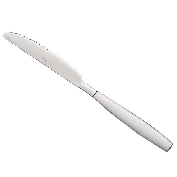 A silver knife with a white handle.