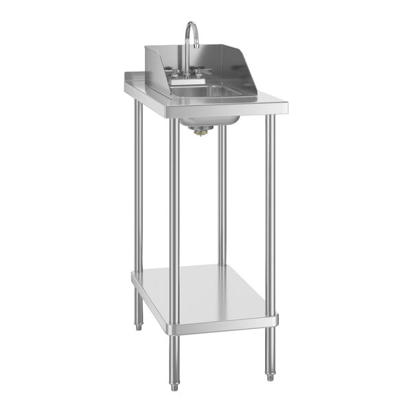 A Regency stainless steel filler table with a drop-in sink and faucet.