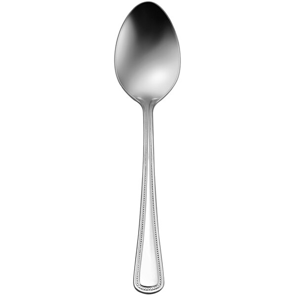 A silver spoon with a black handle.