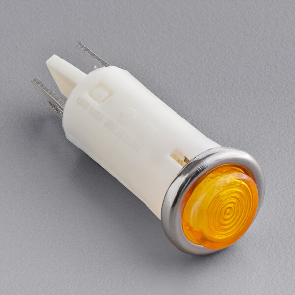 A close-up of a yellow ServIt power indicator light.