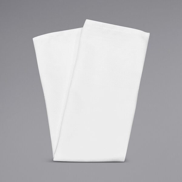 A folded white Milan Birdseye banded cloth napkin.