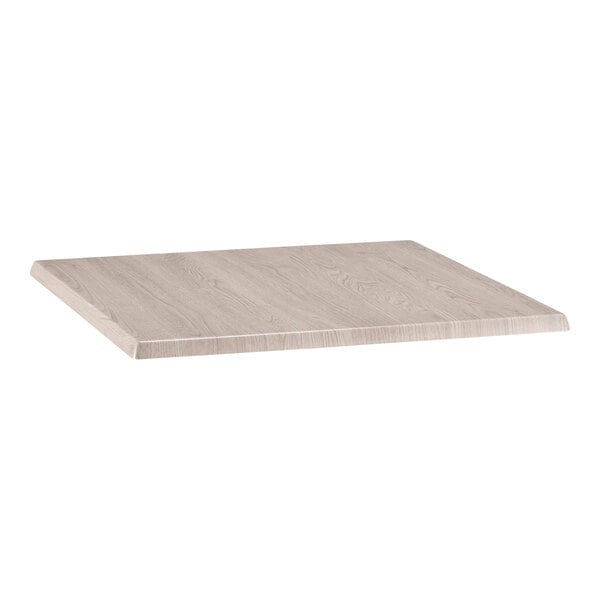 A square white ash laminate table top suitable for outdoor or indoor use.