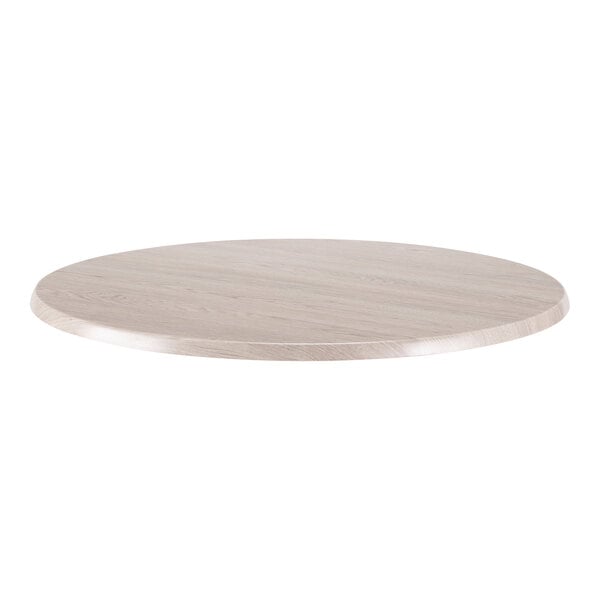A round 36-inch white ash laminate table top suitable for outdoor or indoor use.