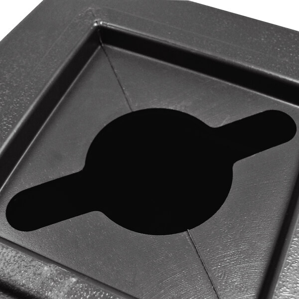 A black square Commercial Zone Polytec recycling bin with a hole for mixed recycling.