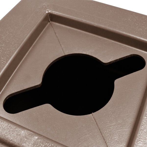 A brown plastic Commercial Zone square recycling bin with a hole for mixed recycling.