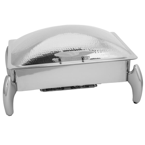 A silver Walco stainless steel chafer with a hammered lid on a counter.