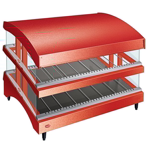 A red Hatco countertop display case with glass shelves.
