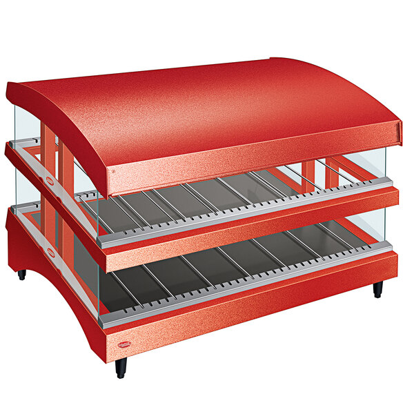 a red food warmer with glass shelves