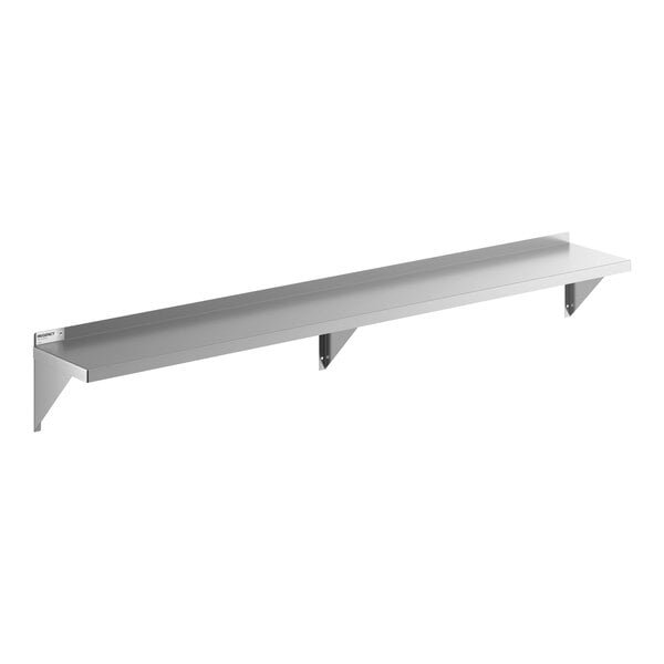 A long, solid stainless steel wall shelf with three supporting brackets.