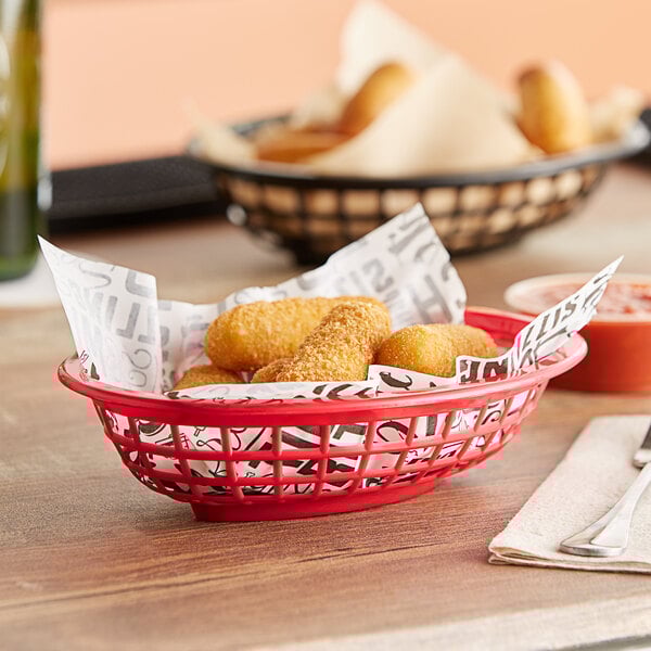A red oval plastic basket filled with fried food.