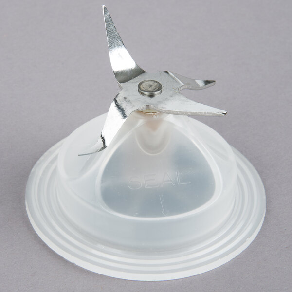 A metal blade repair kit for Waring commercial blenders.