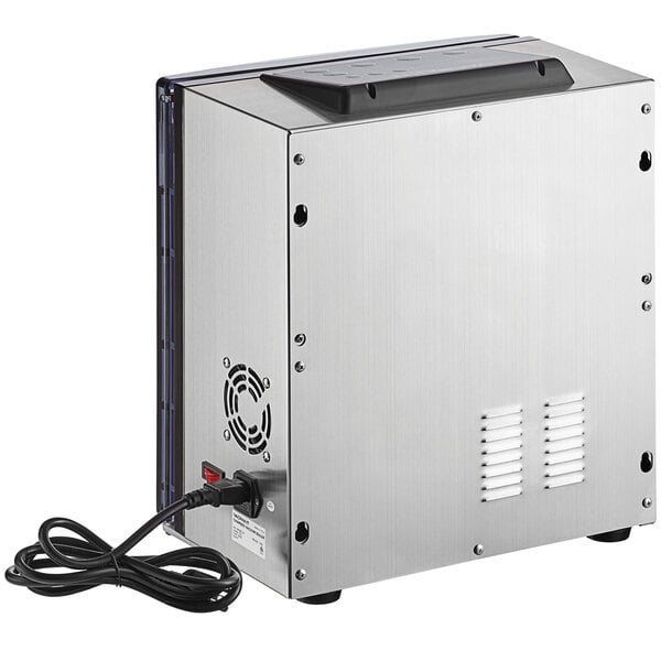 A silver rectangular VacPak-It vacuum packaging machine with a black cord.