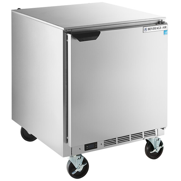 A silver stainless steel Beverage-Air undercounter freezer on wheels.