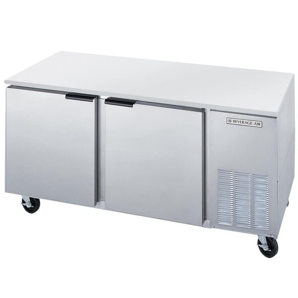 A stainless steel Beverage-Air undercounter freezer with two doors.