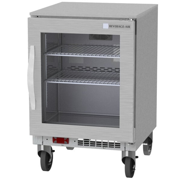 A Beverage-Air undercounter freezer with a glass door and shelves.