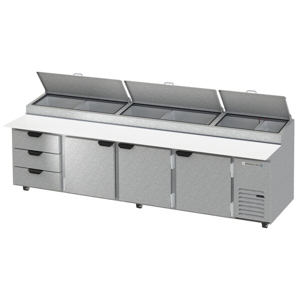 A Beverage-Air stainless steel refrigerated pizza prep table with 3 doors and 3 drawers.